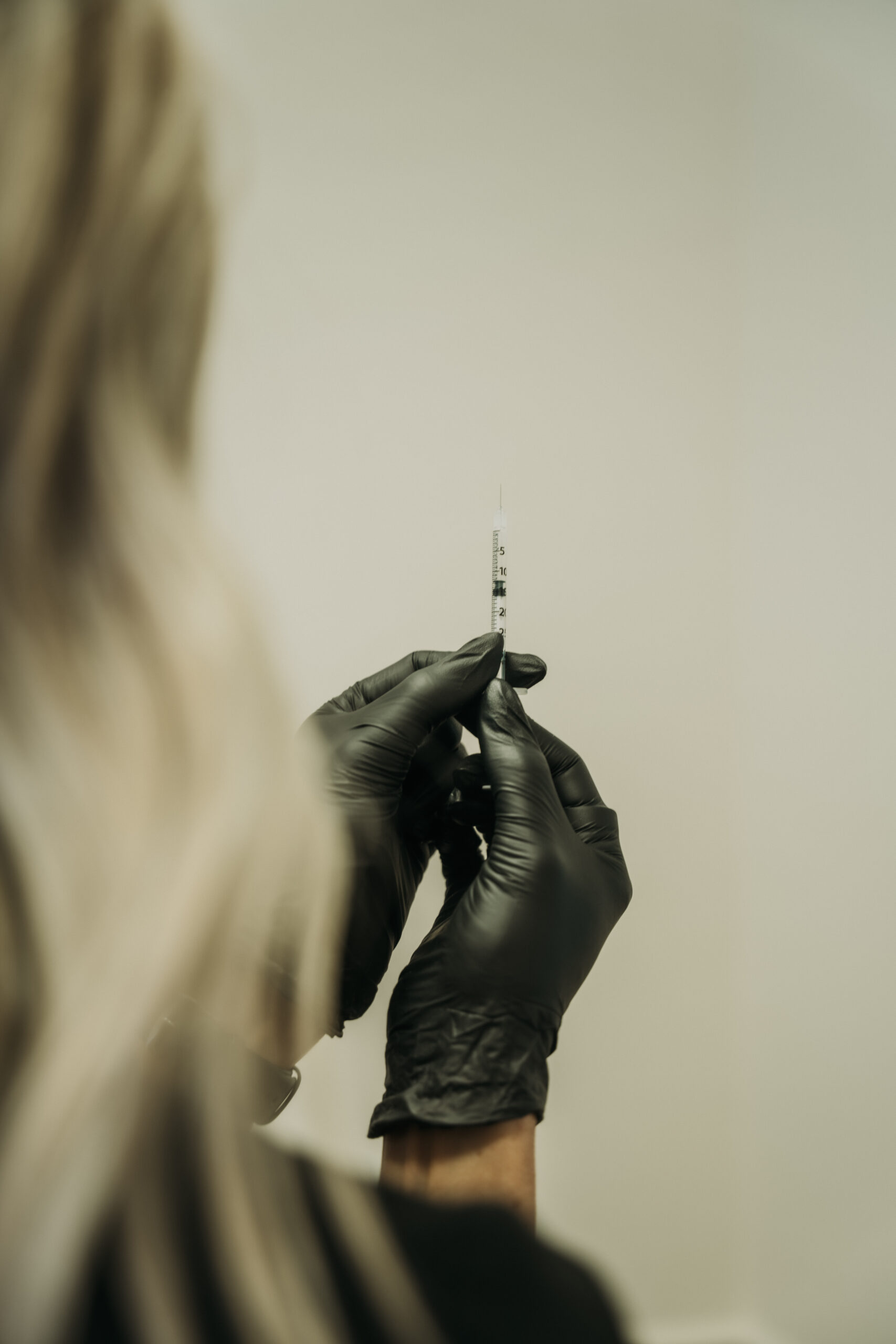 Revival medical provider preparing a precise cosmetic injectable treatment